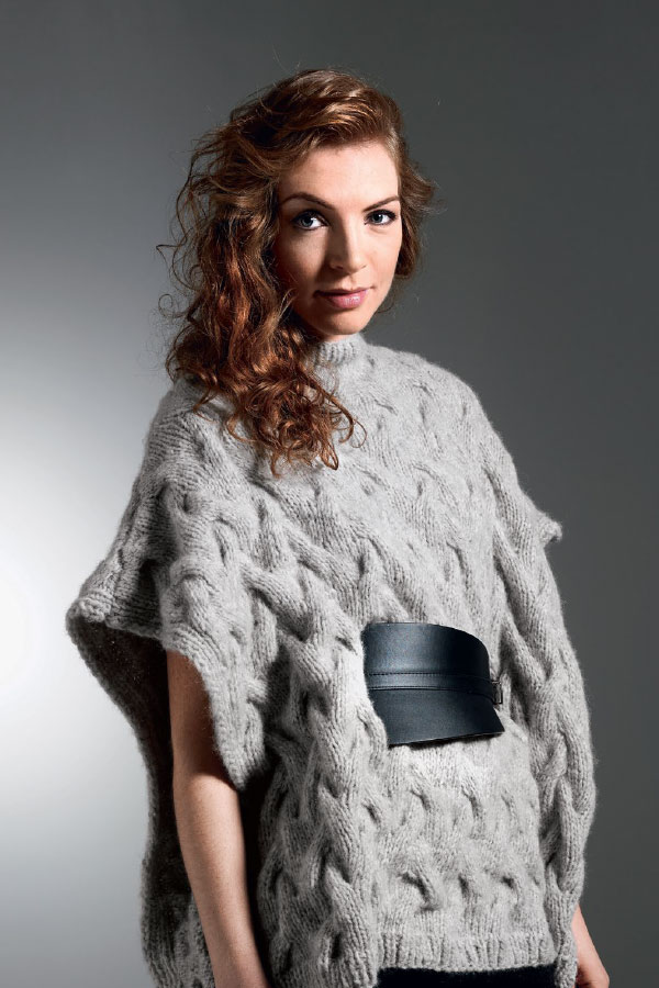 31-04 Poncho med fletter