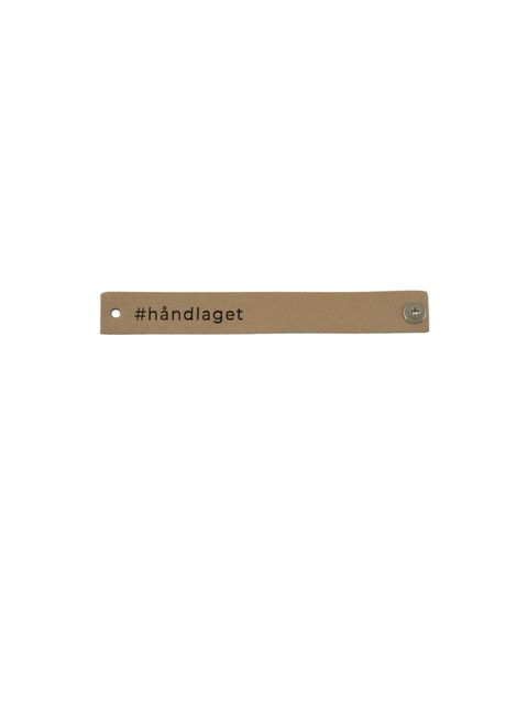 Merke Håndlaget beige