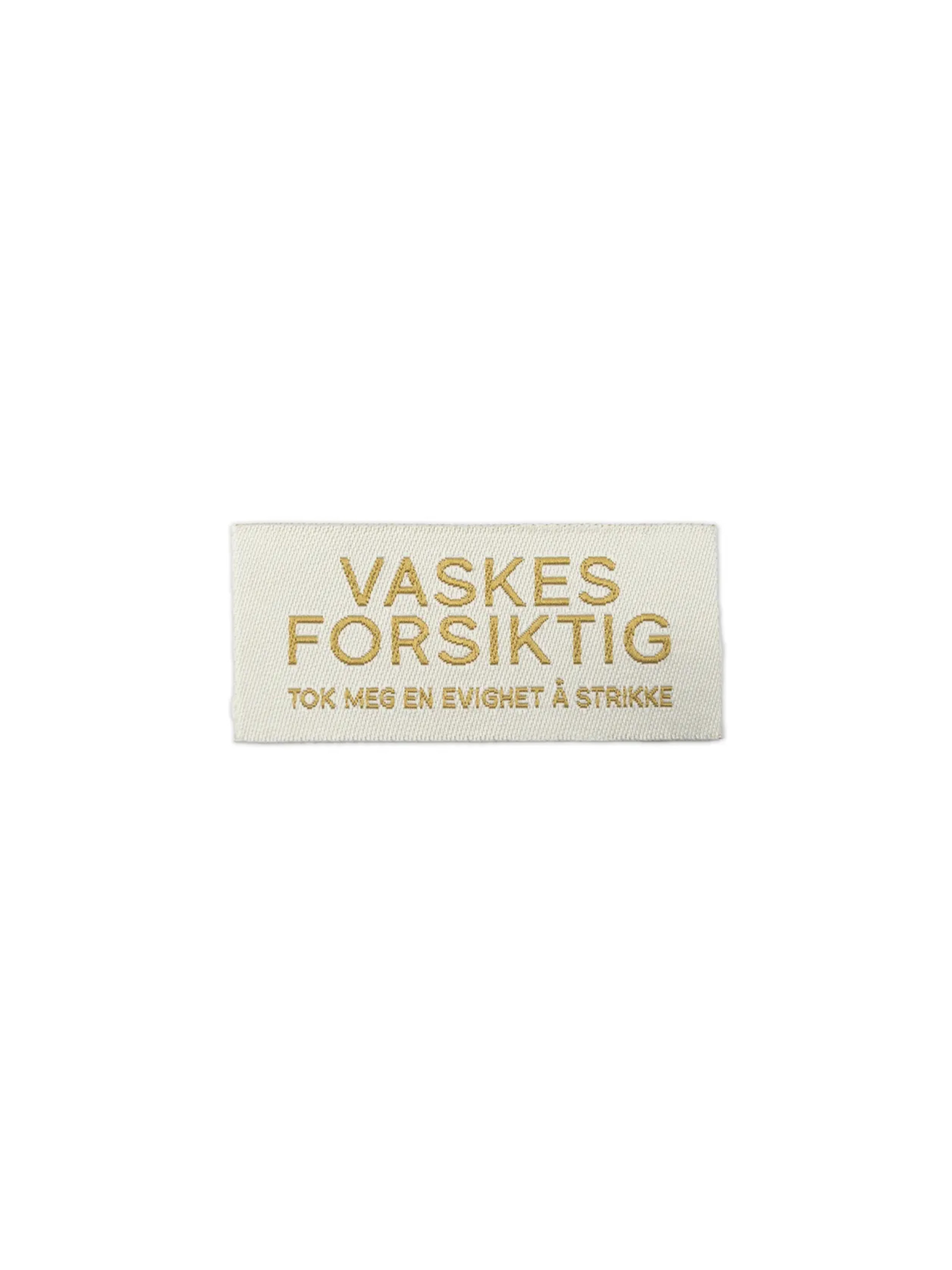 Symerke - Vaskes forsiktig